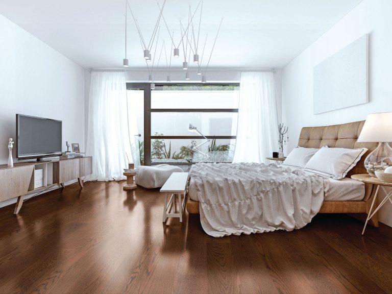 Light wooden flooring in a modern living room interior by Greenlam Industries